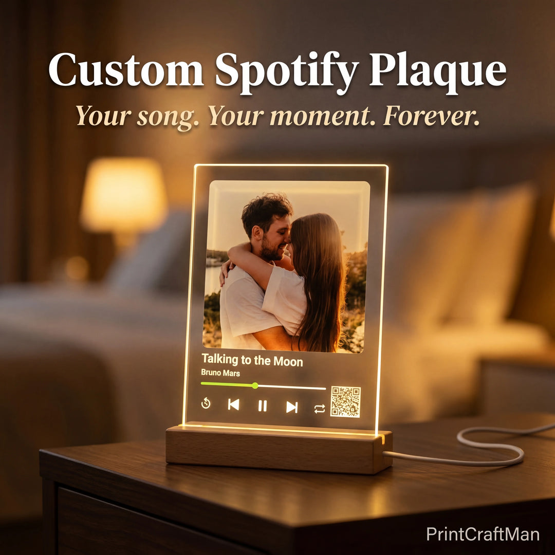Custom Spotify plaque with a couple photo and song details on clear acrylic, lit by a warm LED wooden base on a bedroom nightstand